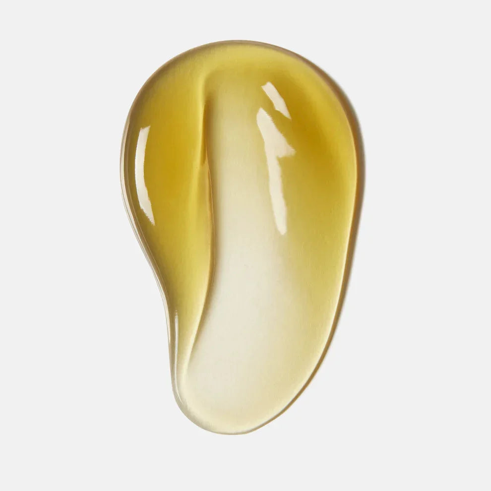 Close-up of a golden hydrating gel skincare serum on a white background